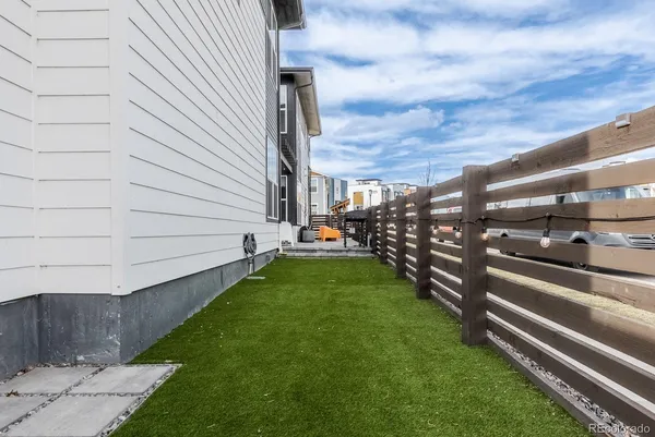 a view of a yard with an outdoor space