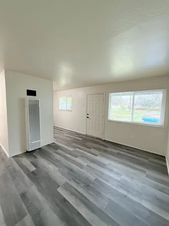 an empty room with window