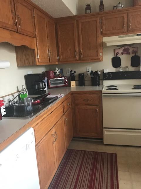 698 Needmore Road Clarksville, TN 37040 - Photo 3 of 13 a kitchen with a sink a stove and cabinets
