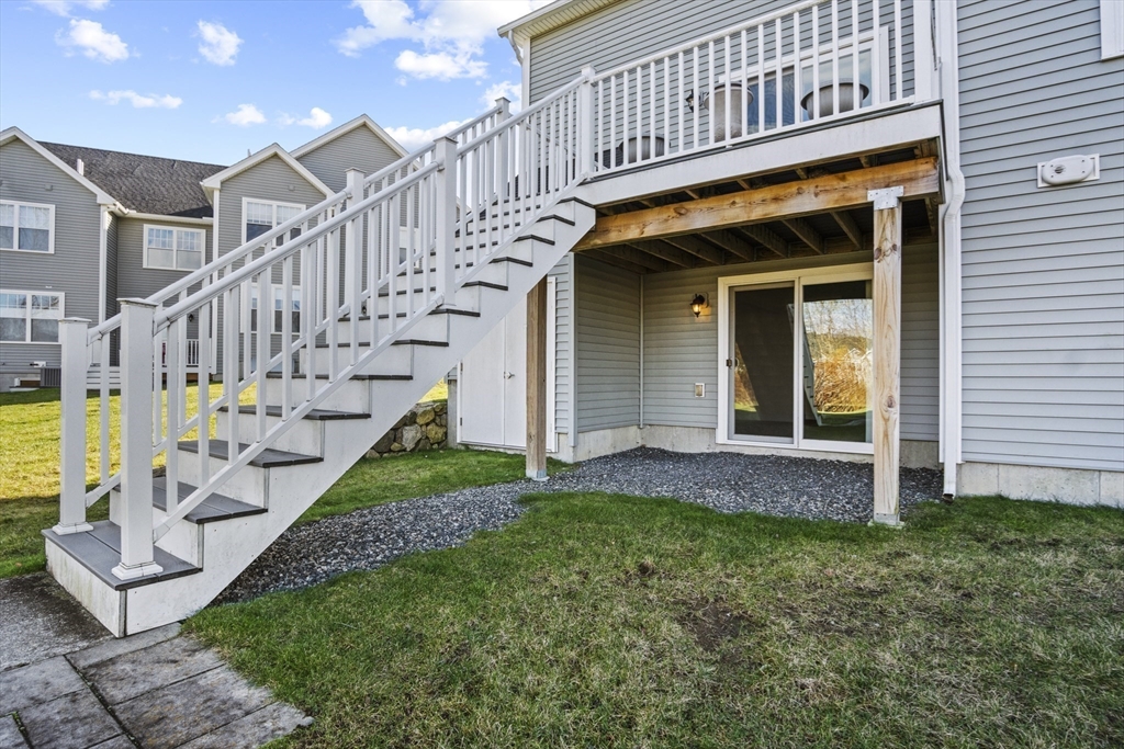 16 Winning Farm Road, Unit 16 Woburn, MA 01801 - Photo 32 of 42 a view of an entrance of the house