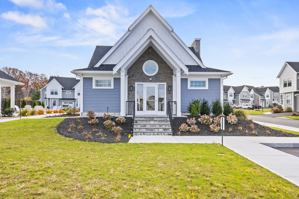 16 Winning Farm Road, Unit 16 Woburn, MA 01801 - Photo 36 of 42 a front view of house with outdoor space and swimming pool
