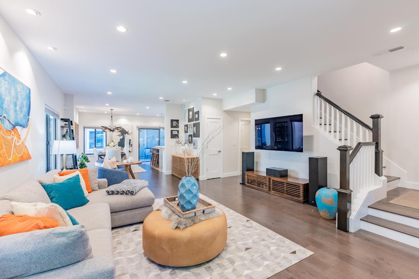 919 La Mesa Terrace, Unit E Sunnyvale, CA 94086 - Photo 1 of 34 a living room with furniture and a wooden floor