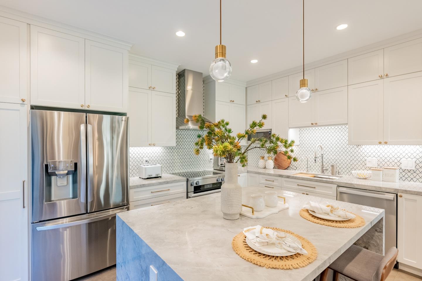 919 La Mesa Terrace, Unit E Sunnyvale, CA 94086 - Photo 11 of 34 a kitchen with stainless steel appliances granite countertop a sink and refrigerator