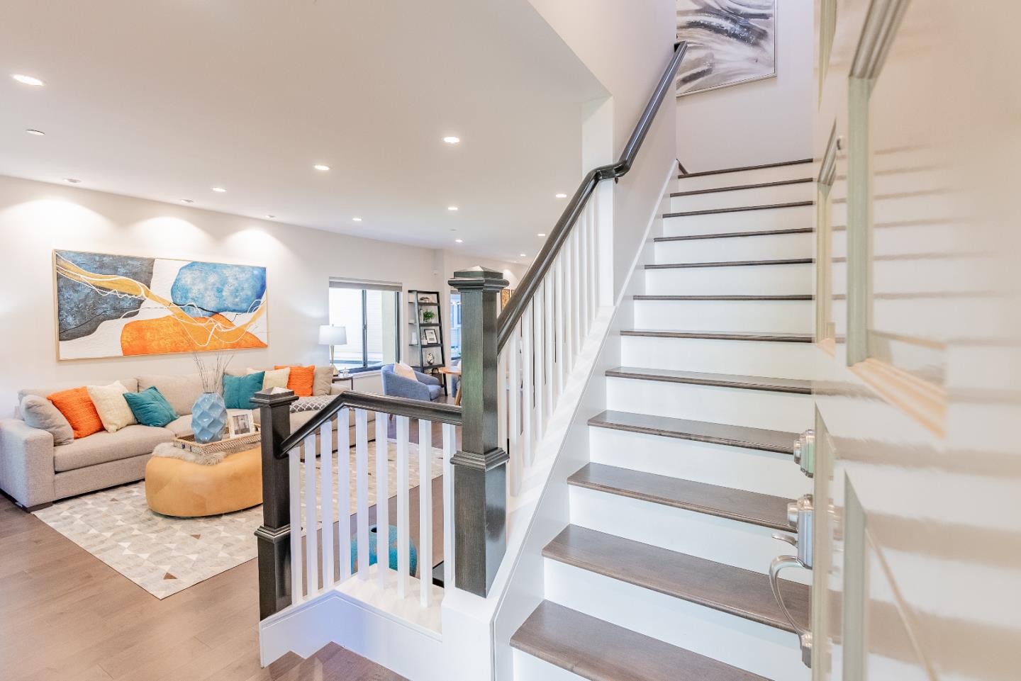 919 La Mesa Terrace, Unit E Sunnyvale, CA 94086 - Photo 2 of 34 a bedroom with furniture and a wooden floor