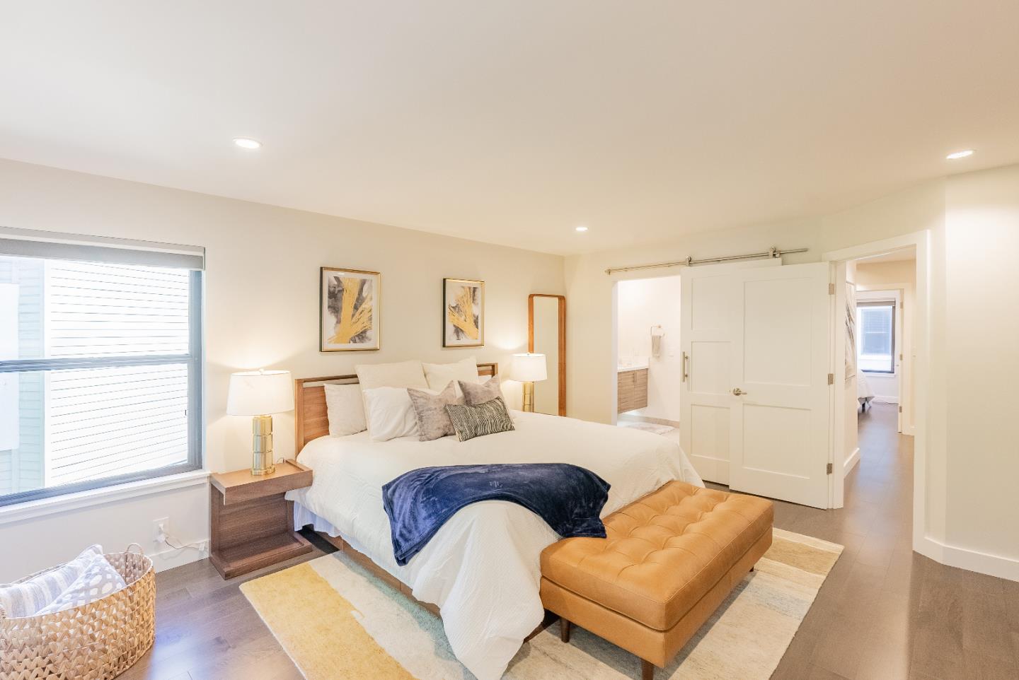 919 La Mesa Terrace, Unit E Sunnyvale, CA 94086 - Photo 23 of 34 a bedroom with a bed and a couch