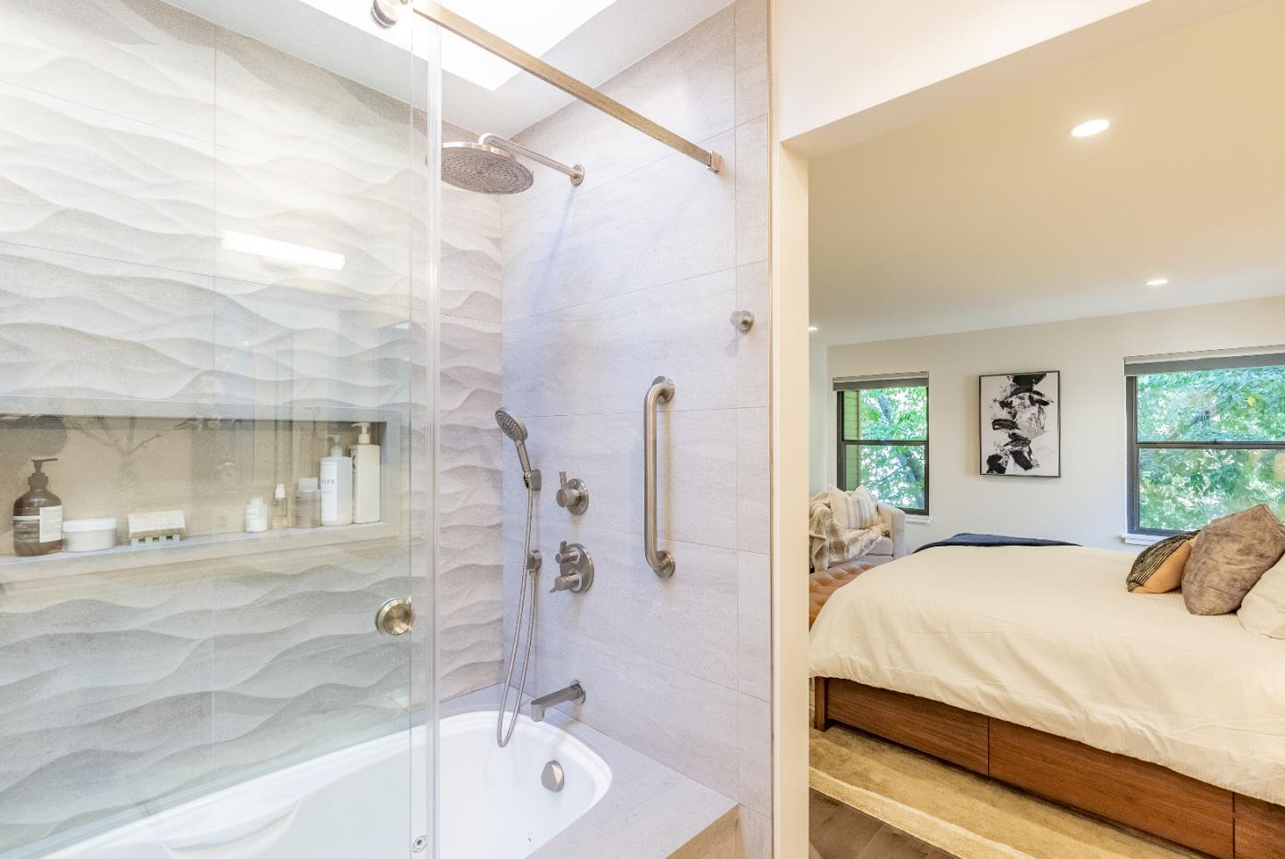 919 La Mesa Terrace, Unit E Sunnyvale, CA 94086 - Photo 28 of 34 a bedroom with a bed and a window with the outer view