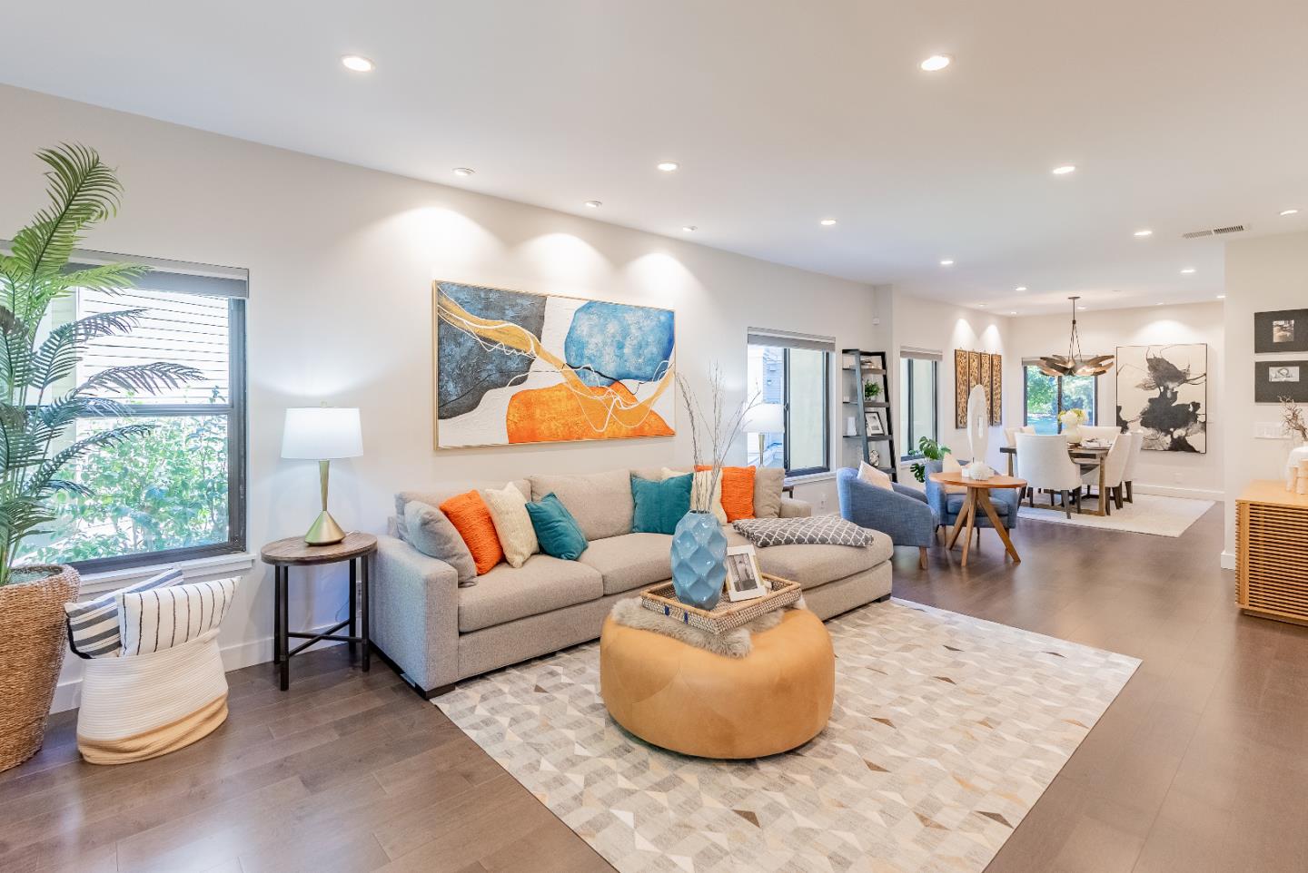 919 La Mesa Terrace, Unit E Sunnyvale, CA 94086 - Photo 3 of 34 a living room with furniture and a large window