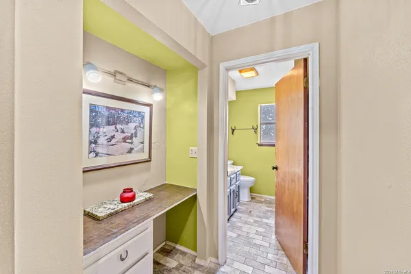 a view of a hallway and a dining room