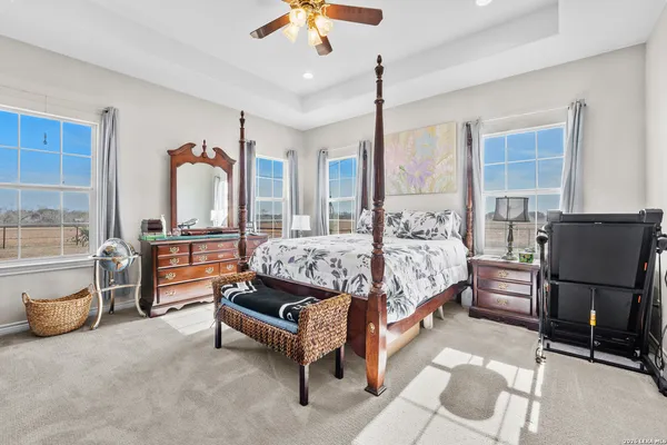 a bed room with a bed and a couch