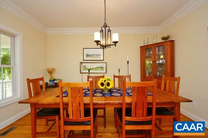 1029 Tilman Road Charlottesville, VA 22901 - Photo 8 of 33 a view of a dining room with furniture window and wooden floor