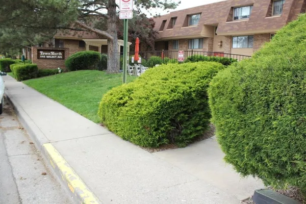 a view of a building with a garden