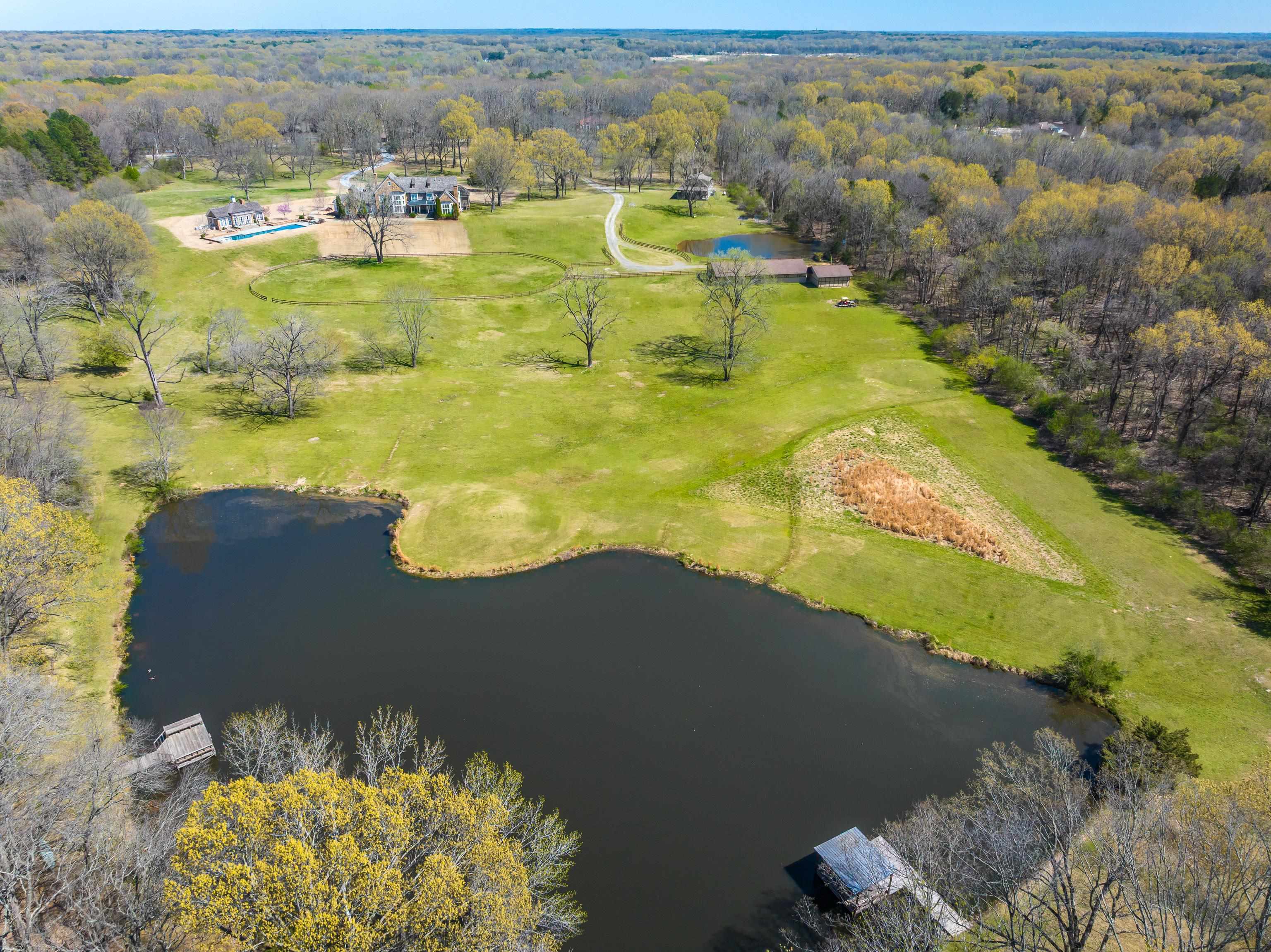 9155 Rocky Cannon Road Memphis, TN 38018 - Photo 12 of 20 a view of a lake with a mountain in the background