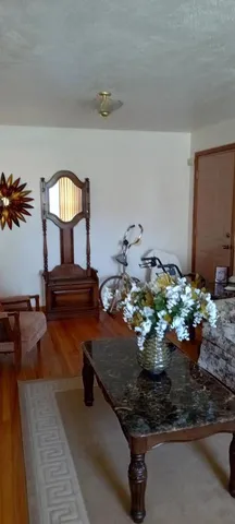 a vase of flowers sitting on a table