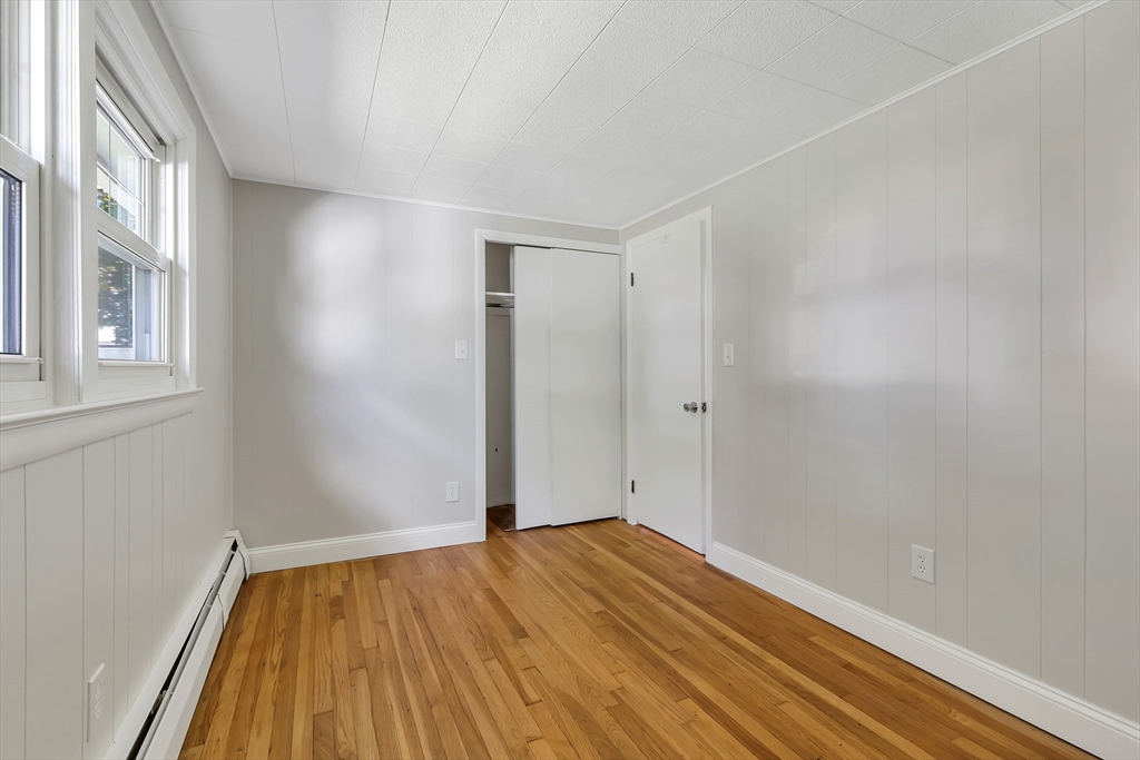 242 Welcome Street Fall River, MA 02721 - Photo 13 of 21 a view of empty room with wooden floor