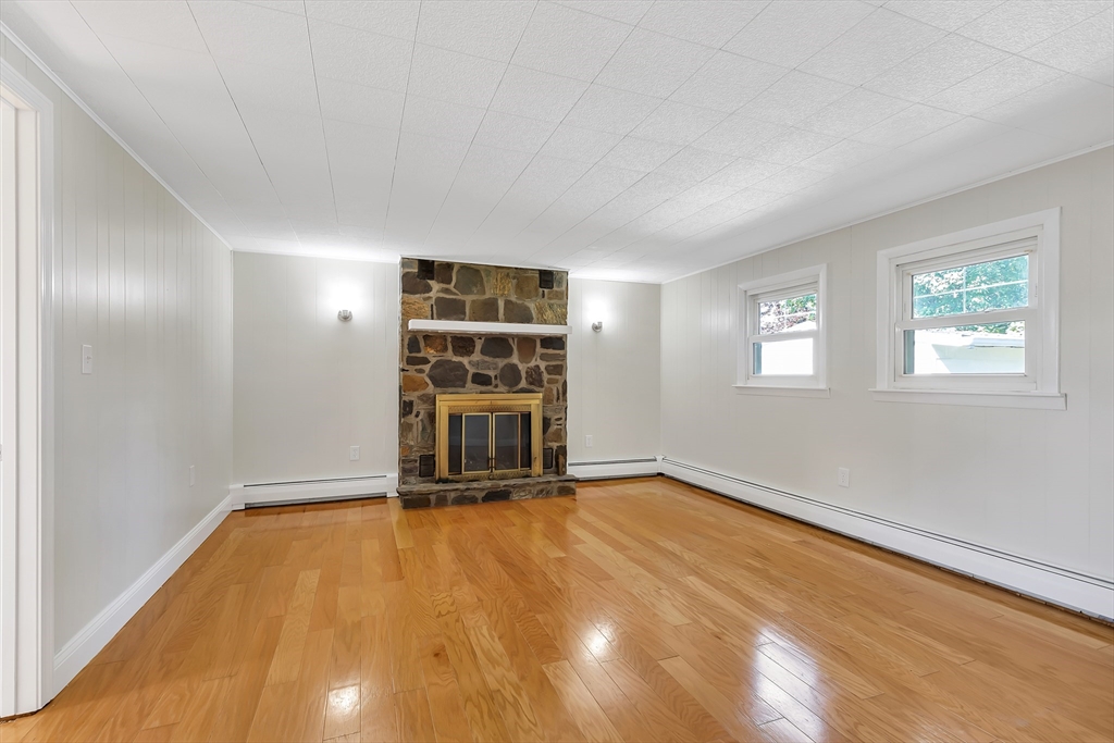 242 Welcome Street Fall River, MA 02721 - Photo 14 of 21 a view of empty room with wooden floor and fan