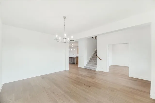 a view of a chandelier in an empty room