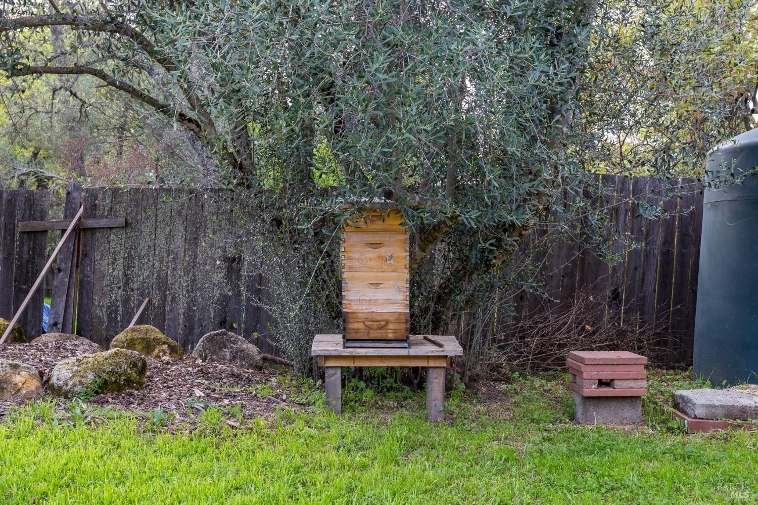 350 Newton Way Angwin, CA 94508 - Photo 34 of 44 a backyard of a house with table and chairs