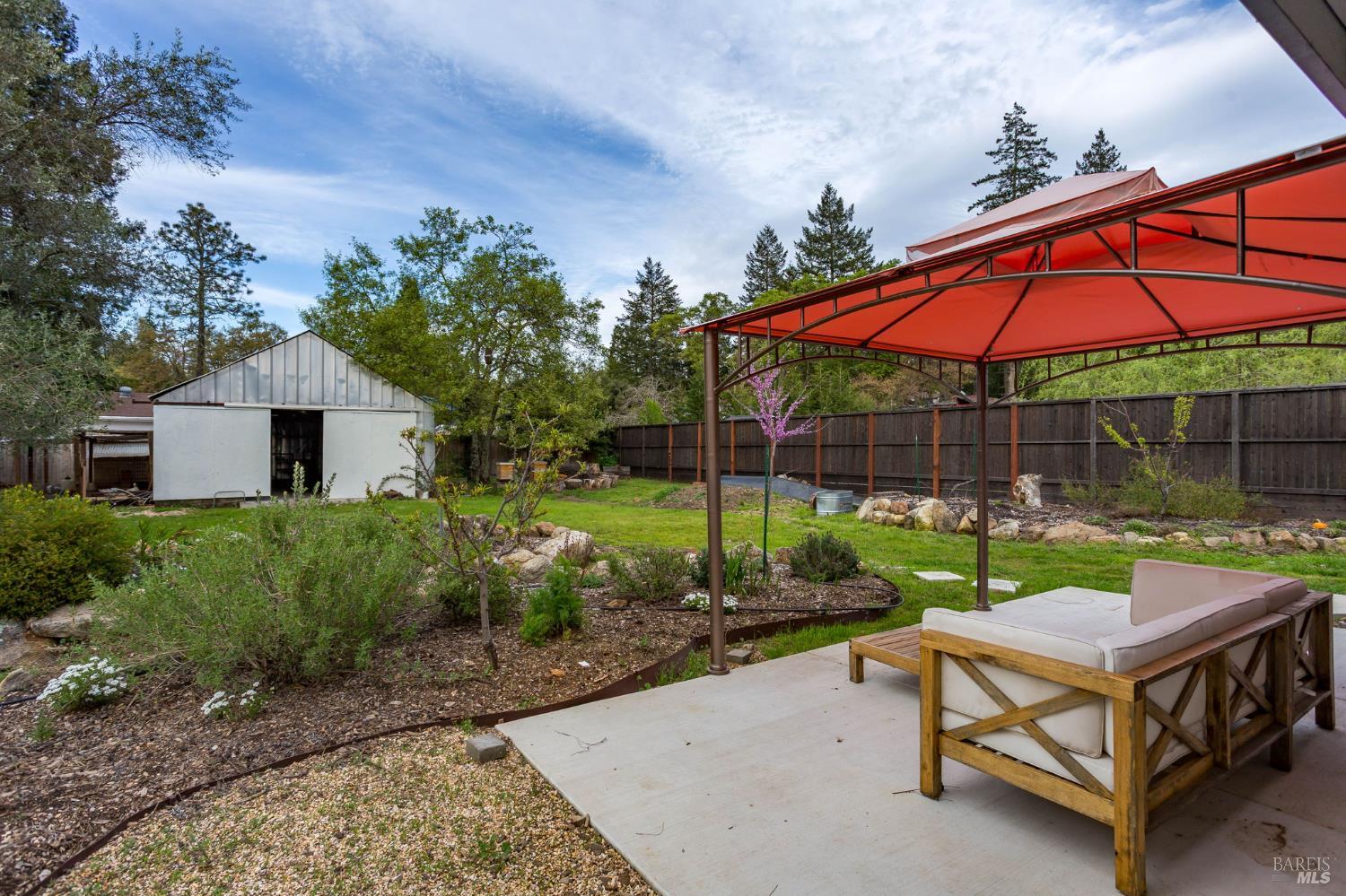 350 Newton Way Angwin, CA 94508 - Photo 35 of 44 a backyard of a house with table and chairs