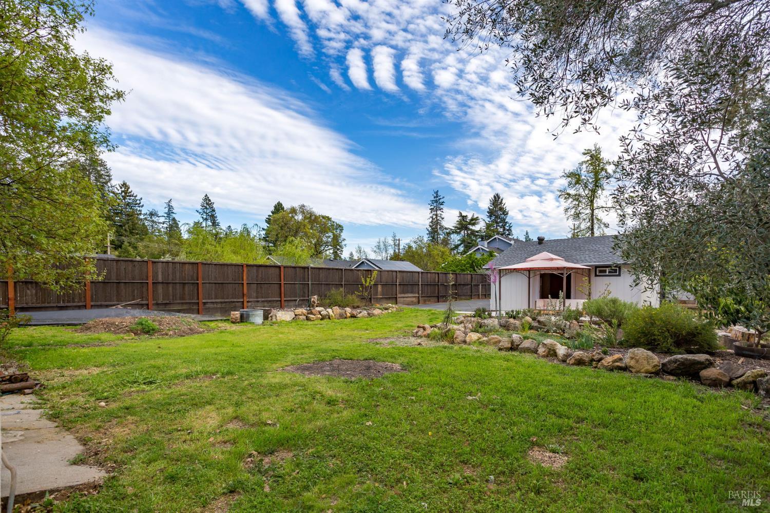 350 Newton Way Angwin, CA 94508 - Photo 39 of 44 a view of a house with a yard and sitting area