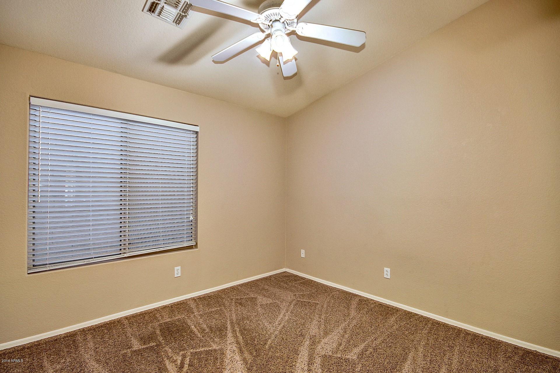 16056 South 18th Avenue Phoenix, AZ 85045 - Photo 20 of 37 a view of an empty room with a window