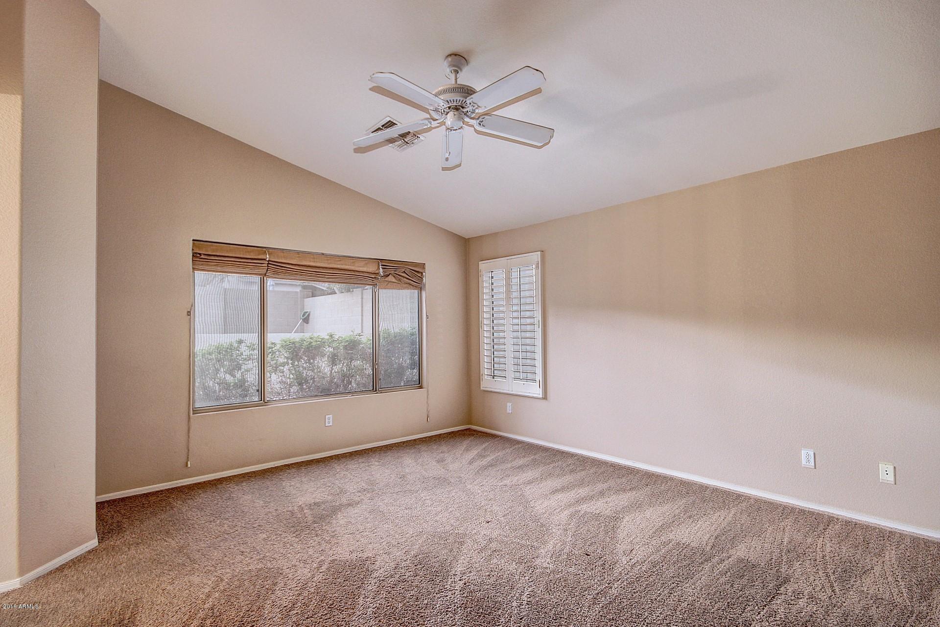 16056 South 18th Avenue Phoenix, AZ 85045 - Photo 22 of 37 a view of an empty room with a window
