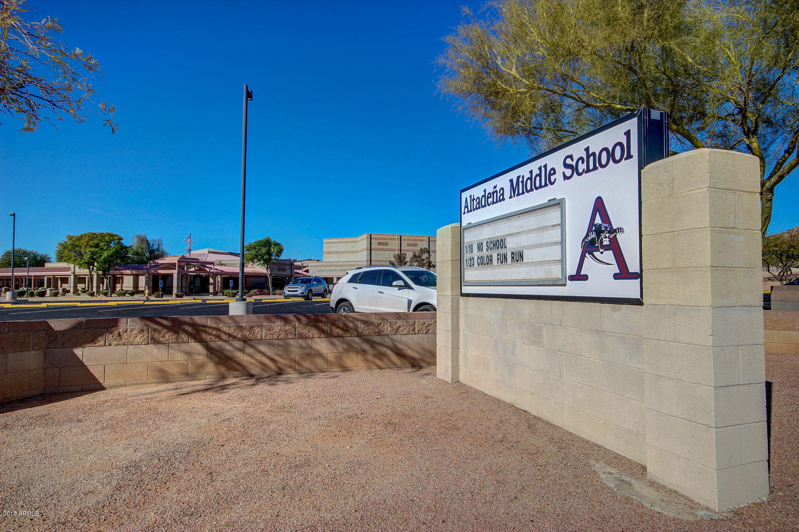 16056 South 18th Avenue Phoenix, AZ 85045 - Photo 28 of 37 a view of a street with tables and chairs