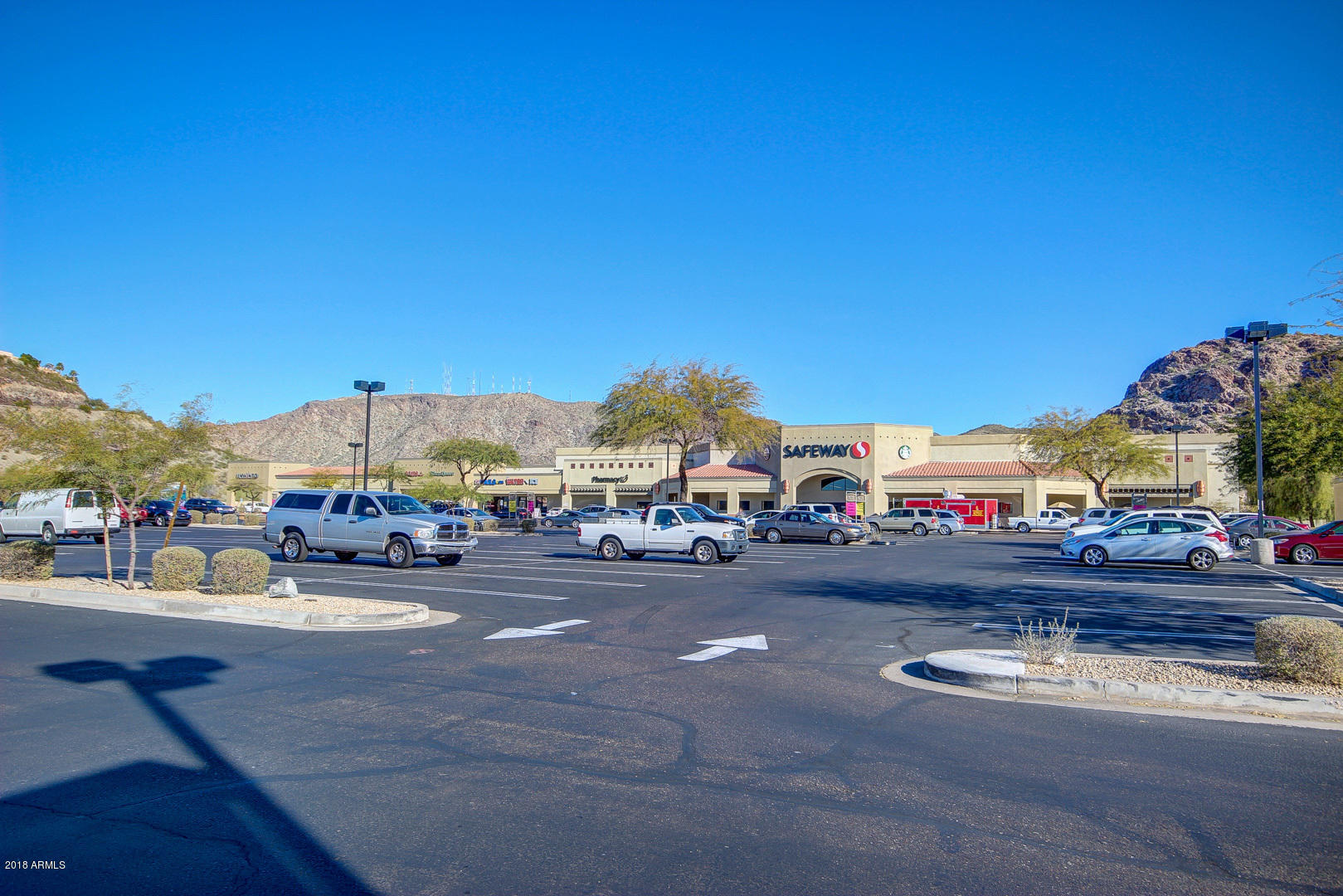 16056 South 18th Avenue Phoenix, AZ 85045 - Photo 34 of 37 a view of a street with cars