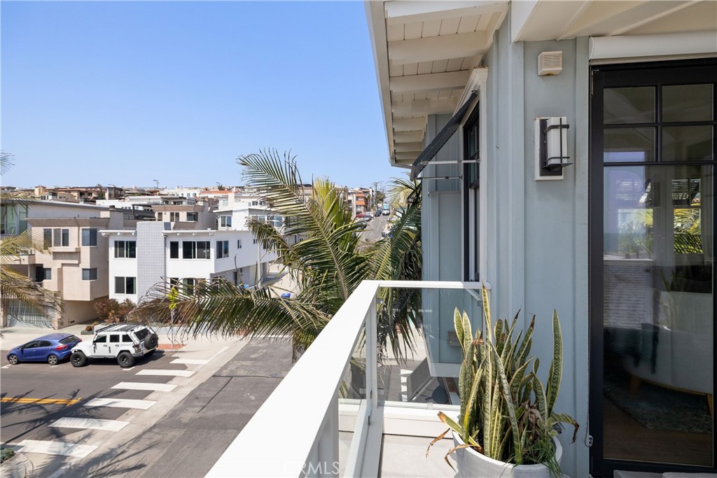 124 23rd Street Manhattan Beach, CA 90266 - Photo 15 of 46 a view of a balcony with plants