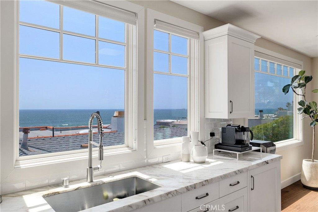 124 23rd Street Manhattan Beach, CA 90266 - Photo 17 of 46 a kitchen with a sink and a window