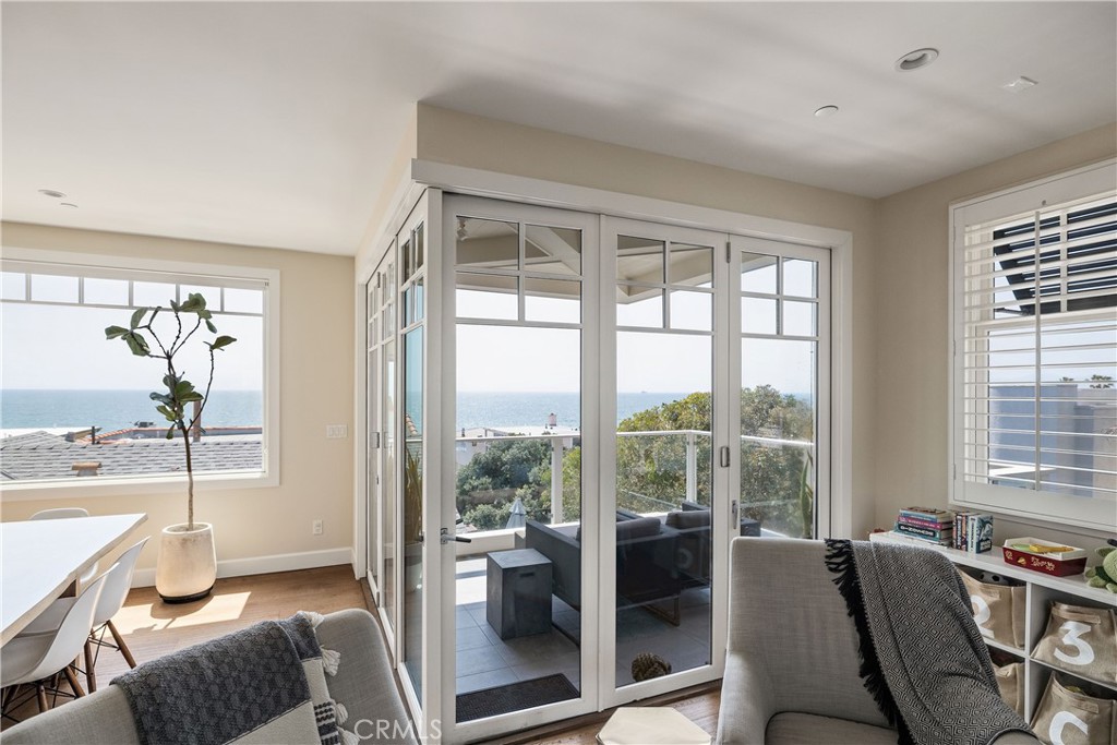 124 23rd Street Manhattan Beach, CA 90266 - Photo 21 of 46 a view of a livingroom with furniture and a large window