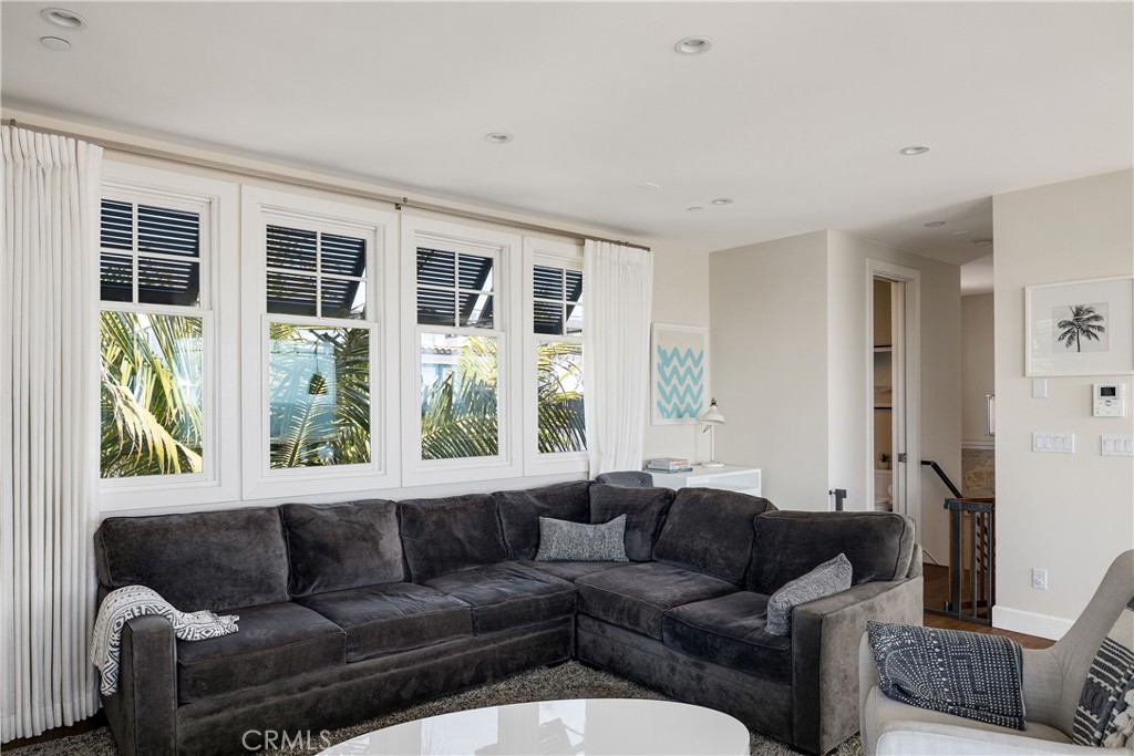 124 23rd Street Manhattan Beach, CA 90266 - Photo 23 of 46 a living room with furniture and a large window