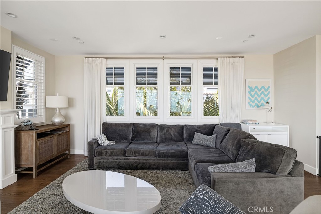 124 23rd Street Manhattan Beach, CA 90266 - Photo 24 of 46 a living room with furniture and a large window