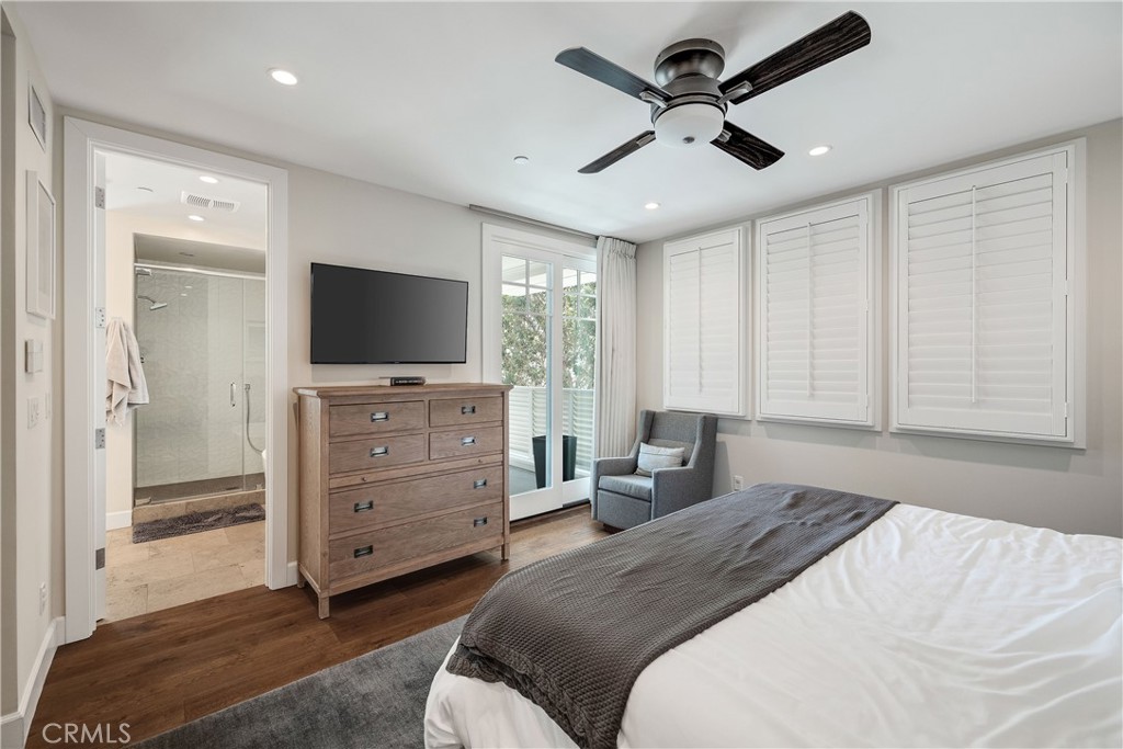 124 23rd Street Manhattan Beach, CA 90266 - Photo 31 of 46 a bedroom with a bed and a flat screen tv