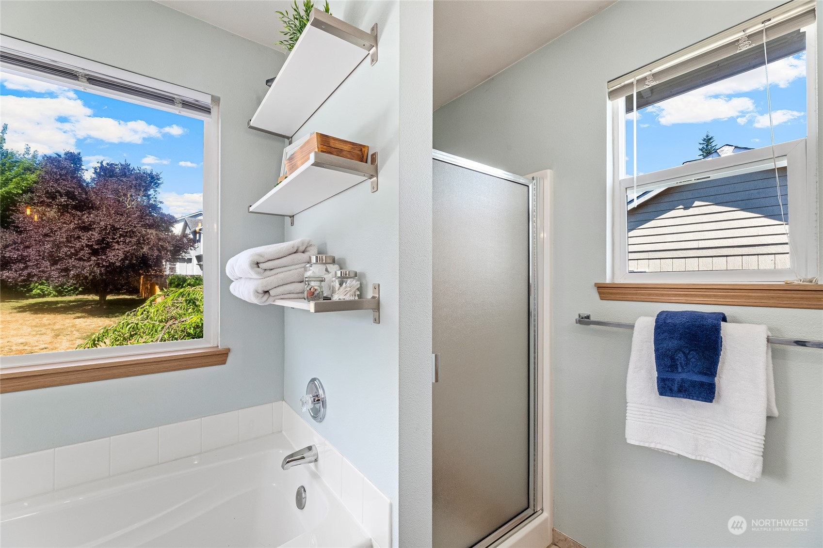 17716 8th Place West Bothell, WA 98012 - Photo 14 of 27 a bathroom with a bathtub and a window