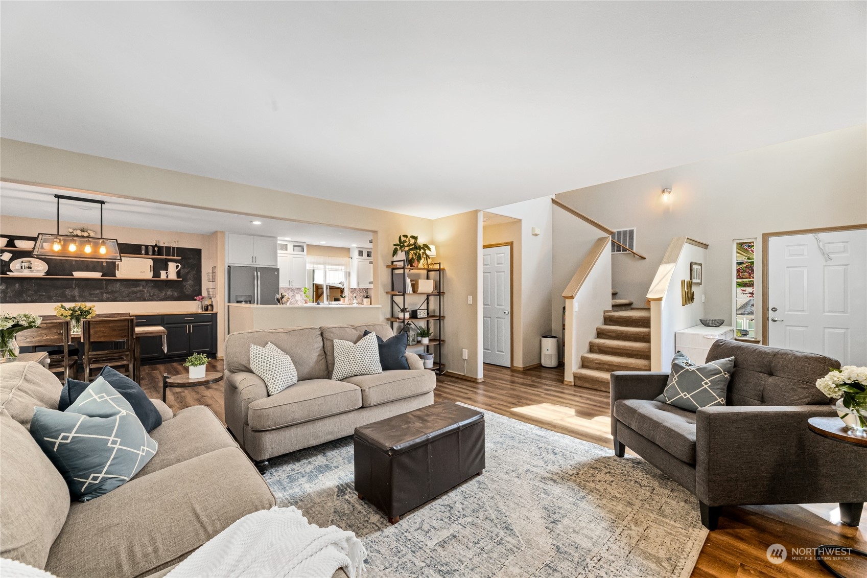 17716 8th Place West Bothell, WA 98012 - Photo 2 of 27 a living room with furniture and a wooden floor