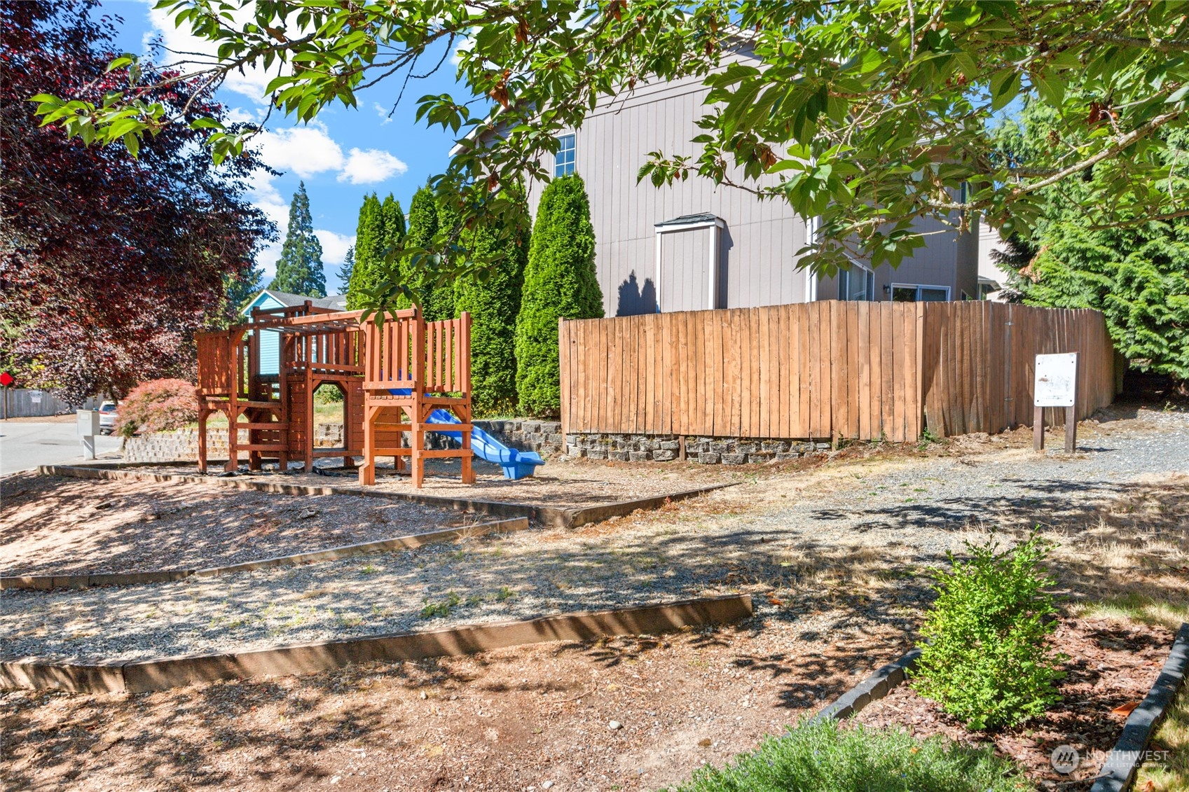 17716 8th Place West Bothell, WA 98012 - Photo 23 of 27 a view of a house with a yard and tree s