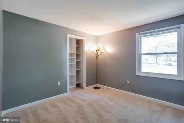 a view of a room with a window