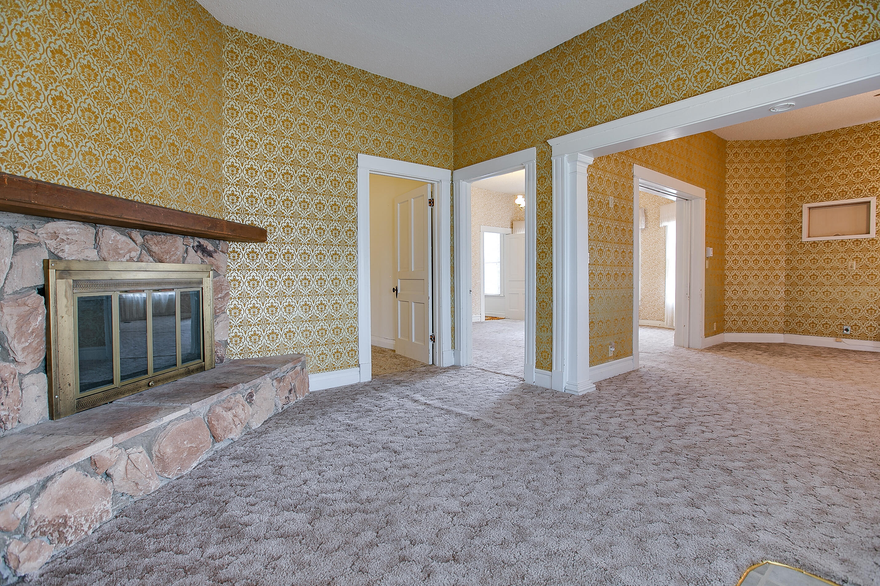 601 North 10th Street Ballinger, TX 76821 - Photo 9 of 29 Living area with fireplace
