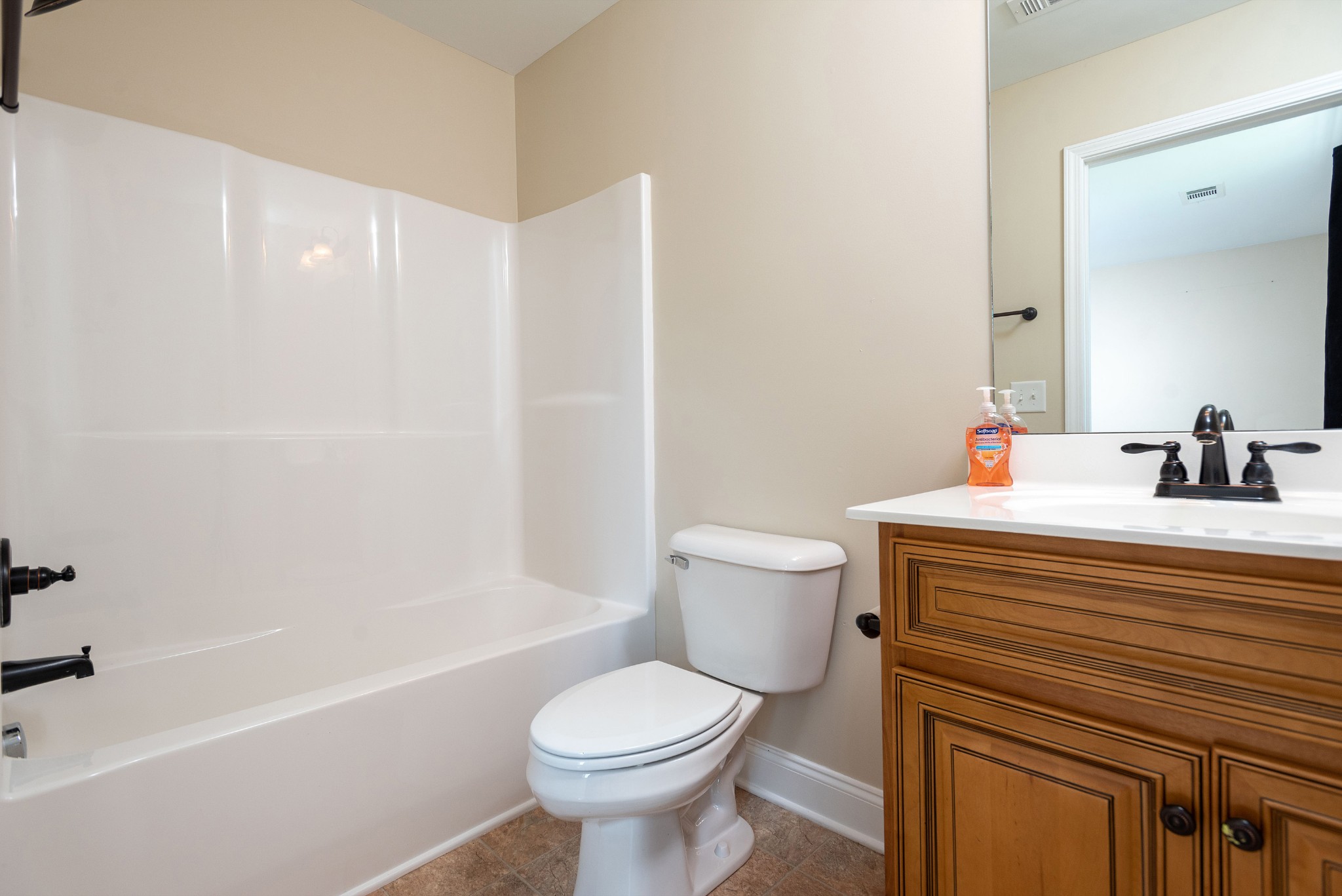 2024 Holloway Road Lebanon, TN 37090 - Photo 25 of 40 a bathroom with a sink toilet and shower