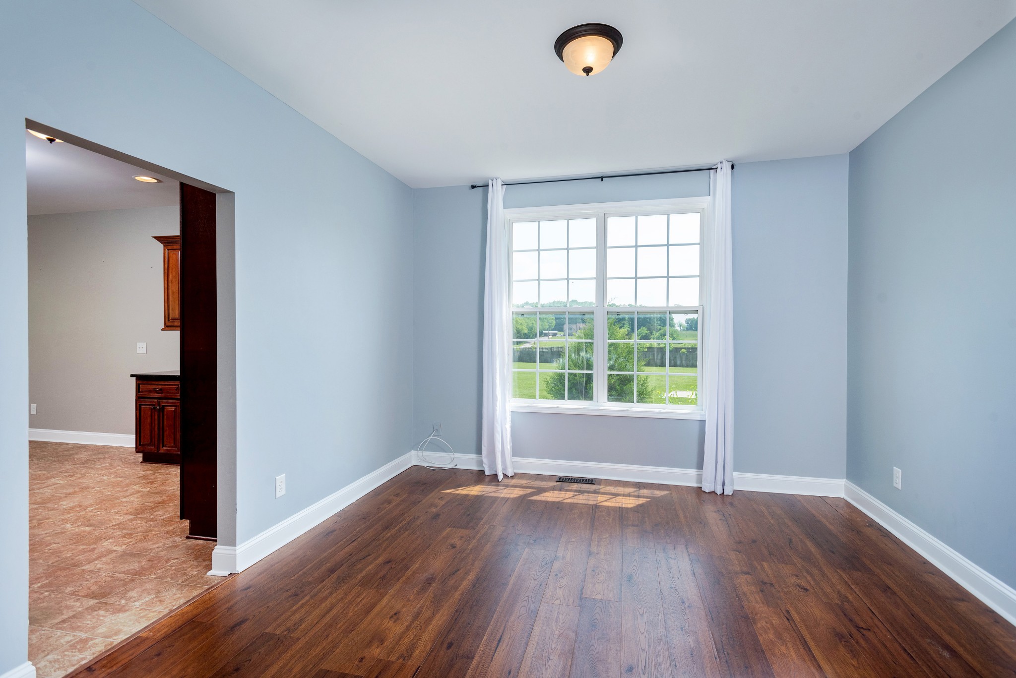 2024 Holloway Road Lebanon, TN 37090 - Photo 8 of 40 a view of a livingroom with wooden floor