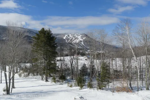 a view of a building with a street