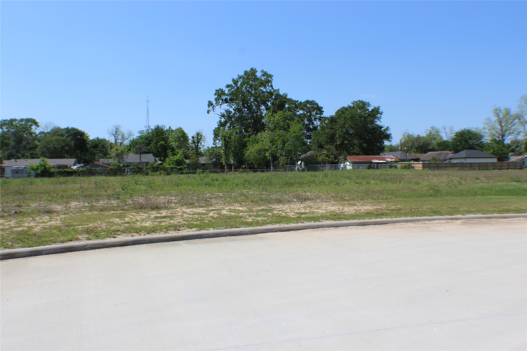 89 Isaacks Road Humble, TX 77338 - Photo 11 of 12 a view of a lake view with a large trees