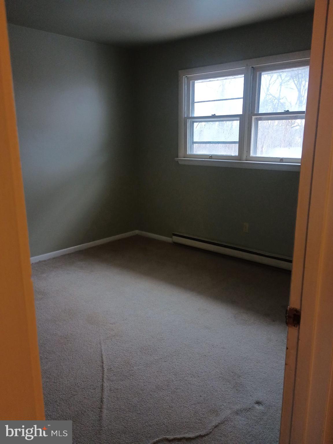 2627 Bainbridge Road, Unit C Bainbridge, PA 17502 - Photo 7 of 11 an empty room with a window