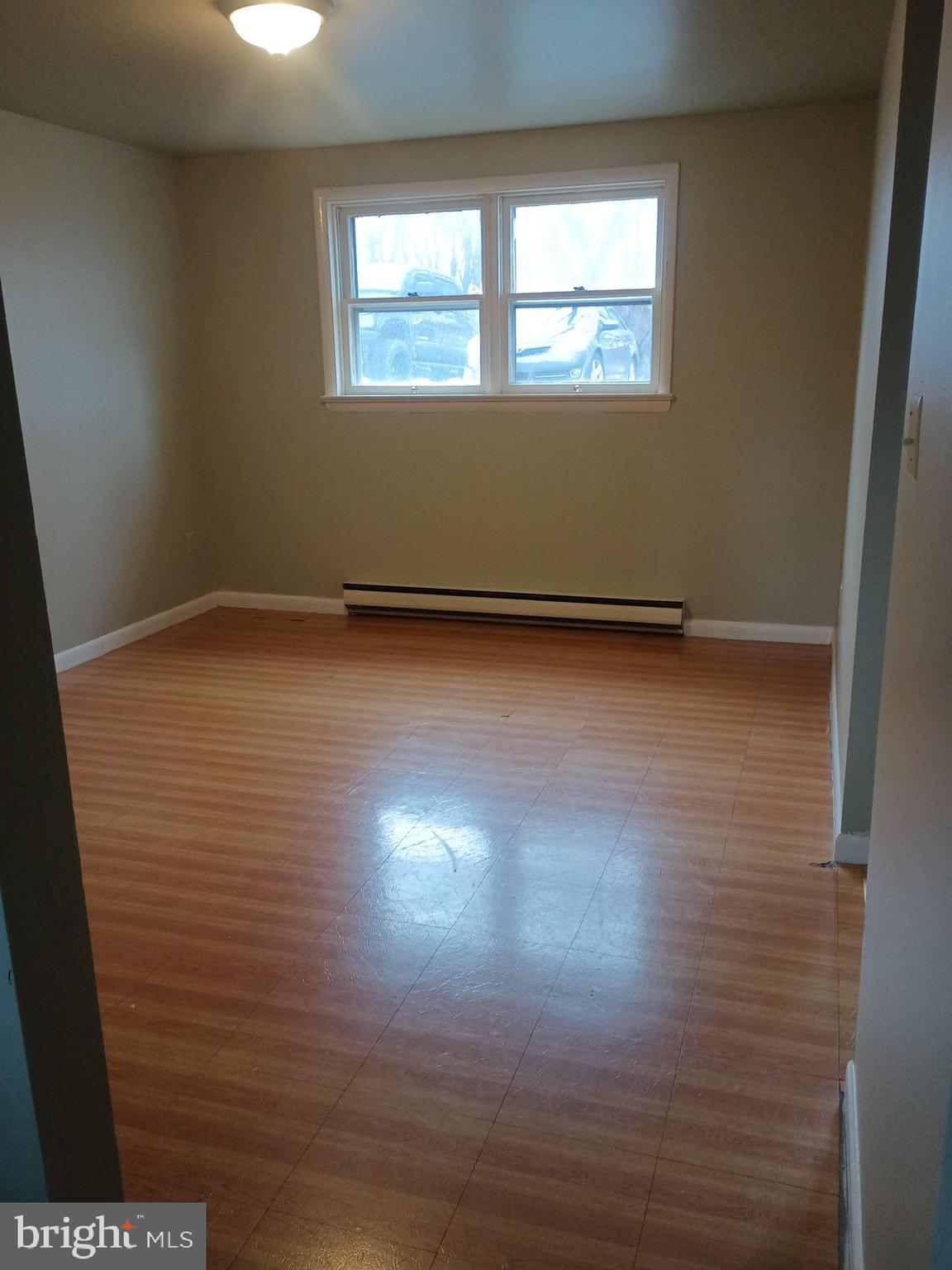 2627 Bainbridge Road, Unit C Bainbridge, PA 17502 - Photo 10 of 11 a view of empty room with wooden floor