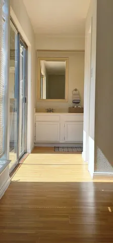 a view of bathroom with bathtub and shower