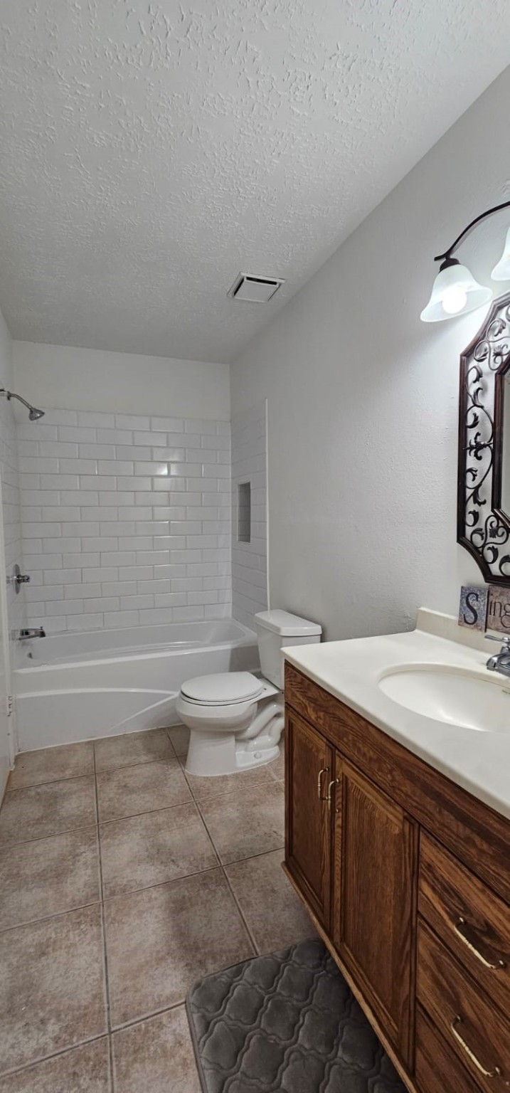 11841 Spring Grove Drive Houston, TX 77099 - Photo 20 of 28 a spacious bathroom with a tub sink and mirror