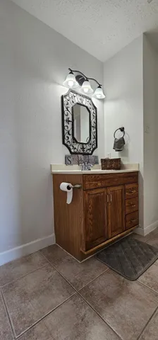 a stove top oven sitting inside of a kitchen