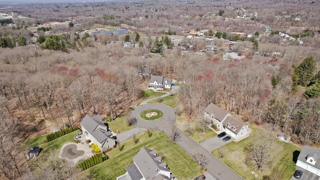 8 Patriot Ridge Lane Wilbraham, MA 01095 - Photo 3 of 8 an aerial view of a house with a yard