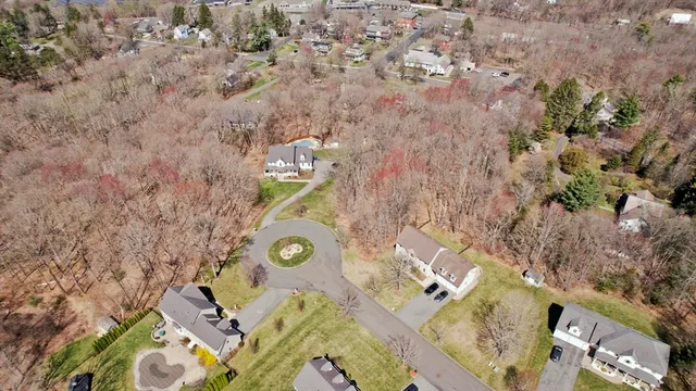 an aerial view of house with yard