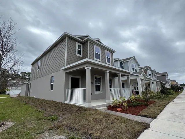 front view of a house with a yard